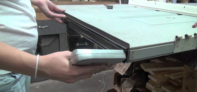 damaged steel door repair Magalia