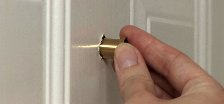 peephole door repair in Magalia